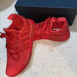 Red adidas NMDs
